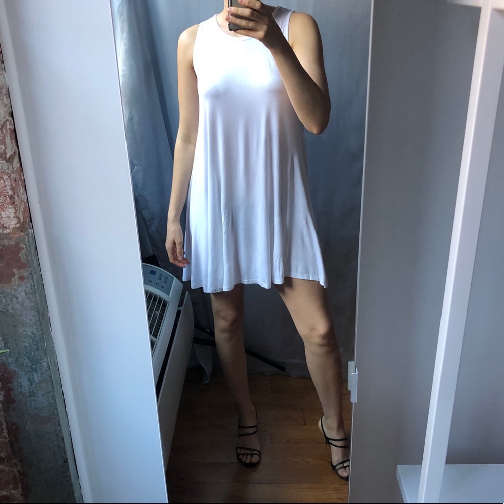 White a-line flowy sleeveless simple dress